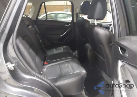 2016 Mazda Cx-5 Grand Touring z USA, uszkodzony, nr VIN JM3KE4DY3G0655577